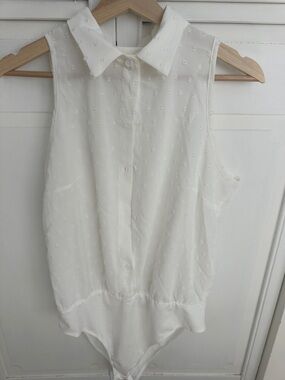 Sleeveless White Button-Up Bodysuit